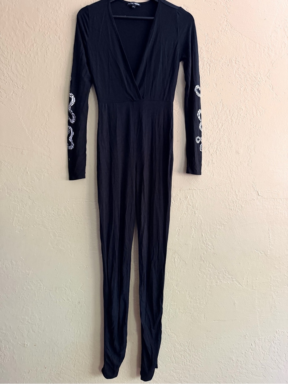 Fashion Nova Black Long-Sleeve Wrap Jumpsuit with White Snake Sleeve Embroidery